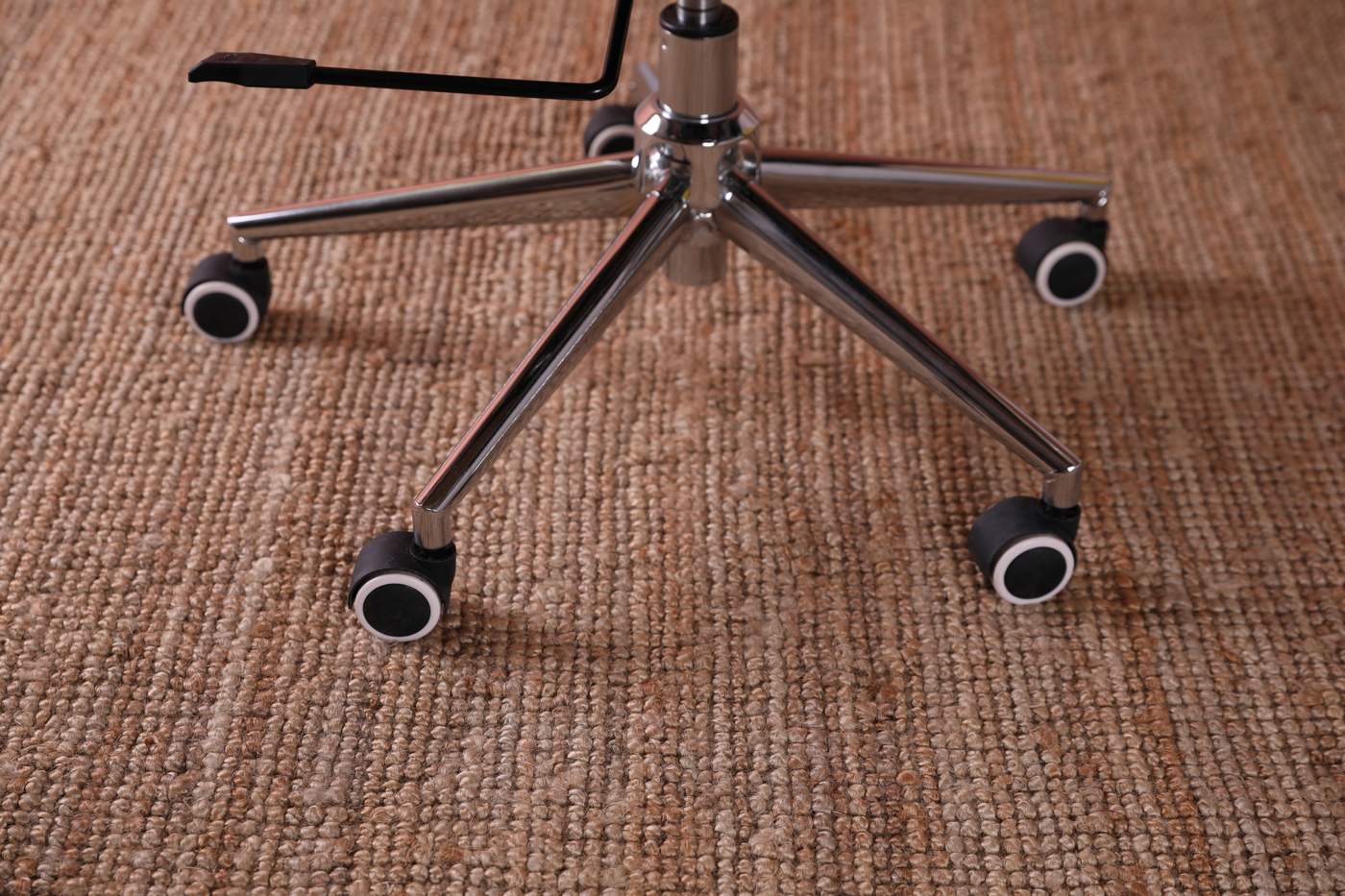 chair wheels on brown carpet